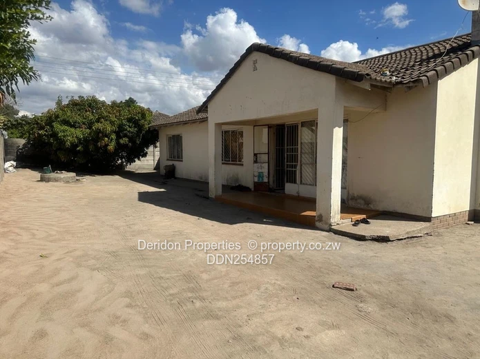 3BR, 2BA Family Home with Spacious Paved Yard in Msasa Park